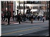 Young people on skateboards fly by while announcing their sentiments about the war.