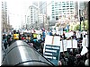 The massive wave of marchers proceed towards civic center for the rally.