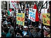 'We will not die for oil', 'Send your own kids to fight', 'No more Bushit'