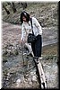 Denise crossing a small creek
