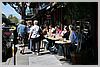 Sidewalk tables along Columbus Av restaurants